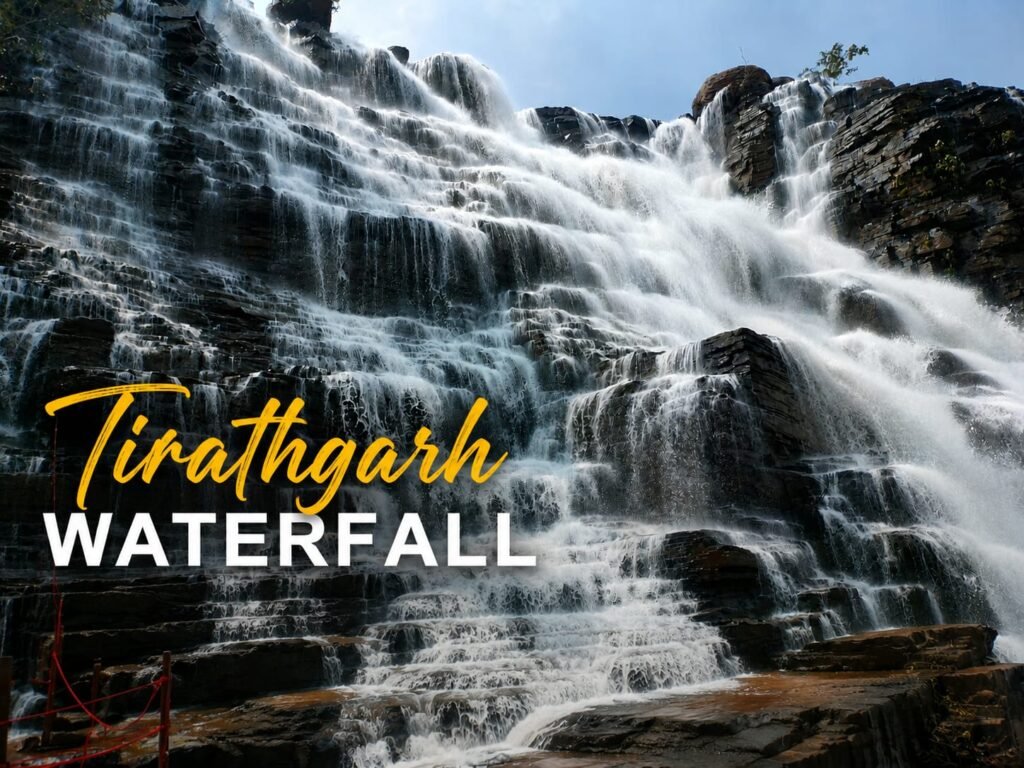 Tirathgarh Waterfall in Kanger Valley National Park, Bastar, Chhattisgarh with cascading multi-tiered waterfalls surrounded by lush green forest.